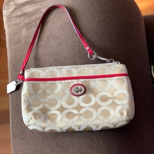Larger coach wristlet